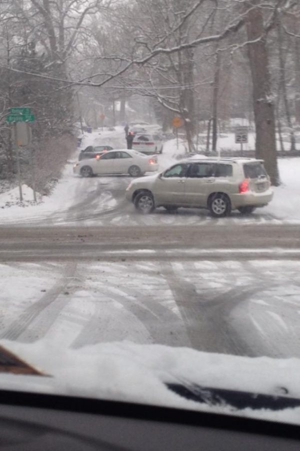 Multiple cars spun-out on Raybrun Rd. during Wednesday mornings snowstorm. Photo courtesy Allison Frank