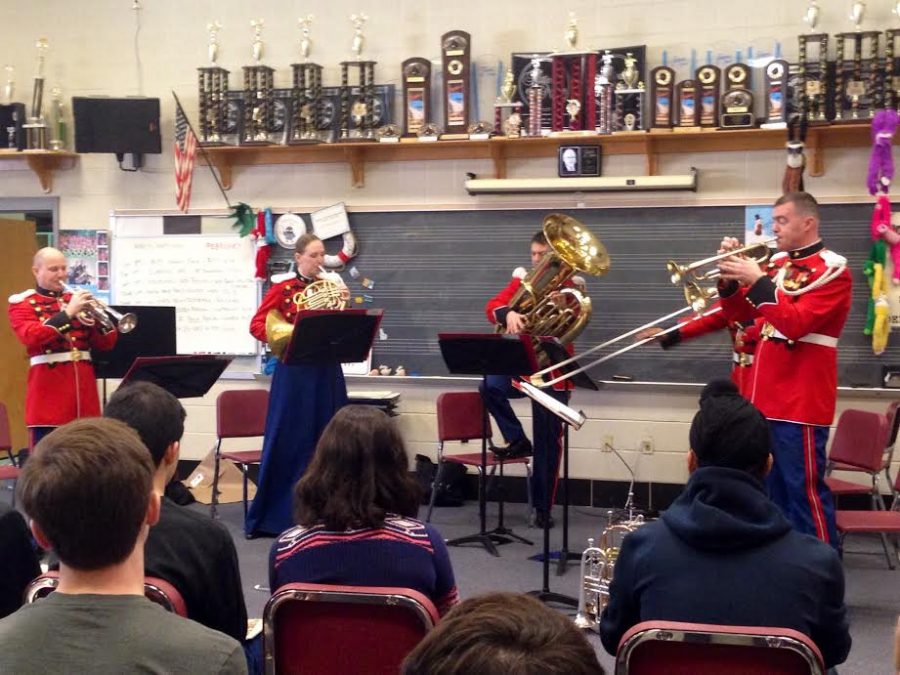 Marine Brass Quintet performs for wind ensemble