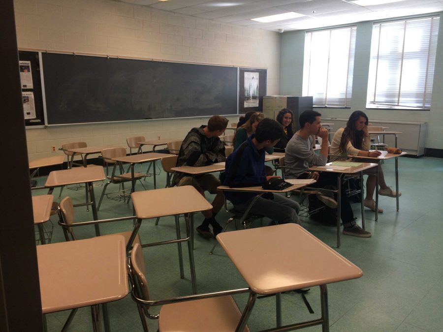 Only 6 out of 22 seniors were present in Mrs. Crewdsons third period AP Lit class.  Many students are absent today, Easter Monday, as it was originally part of spring break.  The county added an extra day to make up for the numerous snow days.  Photo by Julia Pearl-Schwartz.