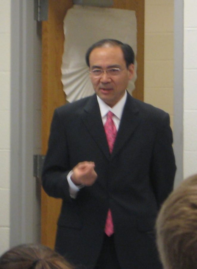 Honda representative Tak Sonada (above) and Mitsubishi representative Tsuney Yanagahira speak to students in international business today during third period. They talked about the various aspects of operating a global company, like alleviating the effects of the recession. Photo by Carolyn Freeman.