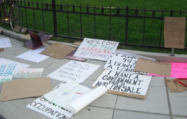 Protest signs surround McPherson Square in downtown D.C. as part of the Occupy D.C. protest movement. Based on the Occupy Wall Street group, the protesters want to take money out of politics and reform economic policies. Photo by Gigi Silver.