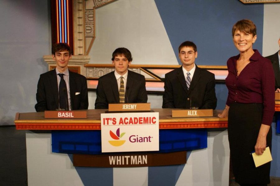 Seniors Basil Smitham (left), Jeremy Steinberg (center) and Alex Luta compete on NBCs Its Academic in an episode that airs Nov. 12 at 11 a.m. Photo courtesy Alex Luta.