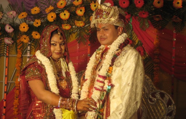 The bride and groom enjoy the exchanging of garlands ceremony, part of a typical 48-hour Indian wedding. Photo courtesy Eyal Hanfling.