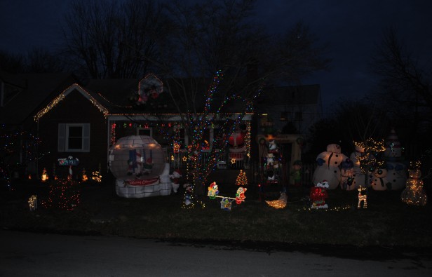 The Roark familys home in Cabin John features dozens of holiday decorations that cover the entire lawn. They started putting up lights ten years ag,o and the display has expanded each year. Photo by Chris Hoogstraten. 