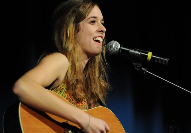 Senior Kaitlin Payne sings Joni Mitchells Big Yellow Taxi, a performance that earned her the title of Whitman Idol. The talent competition Jan. 25 raised about $2,700 for the Leukemia and Lymphoma Society.. Photo by Billy Bird.
