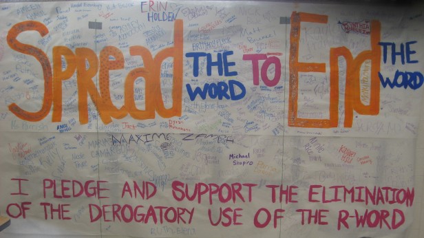 Members of the Best Buddies club posted a banner by room B-212 this month to raise awareness about ended the offensive use of the R-word. Hundreds of students have signed the banner. Photo by Lucy Chen.