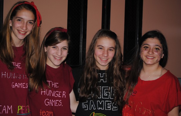 Many Hunger Games fans dressed up to show their support for the movie last night, including these Westland MS students. The movie premiered last night.