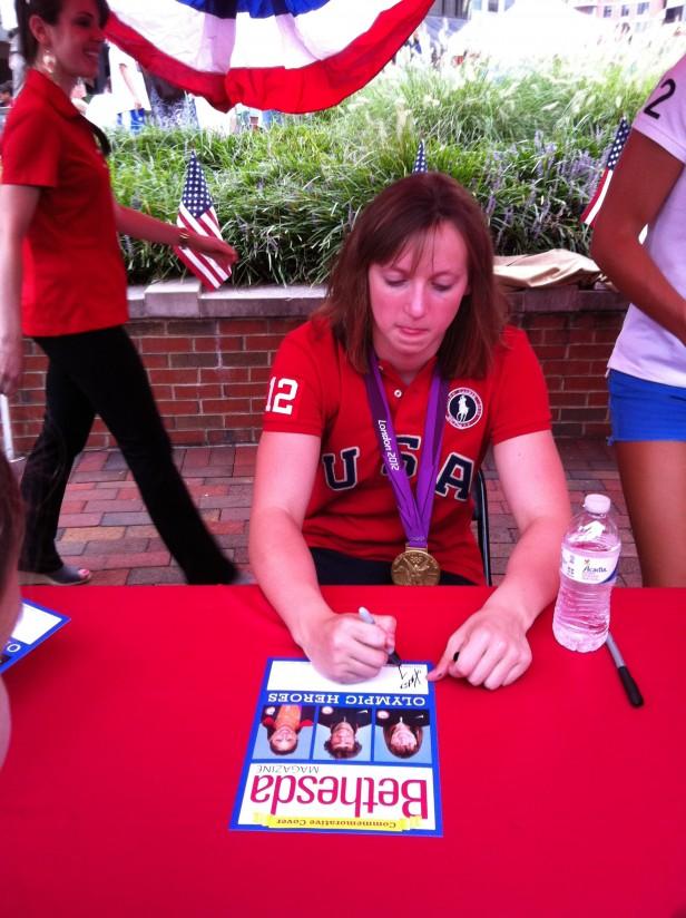 Swimmer Katie Ledecky signs autographs for the Bethesda community. The 15 year old was the youngest member of the Olympic team. Photo by Tamar meron.