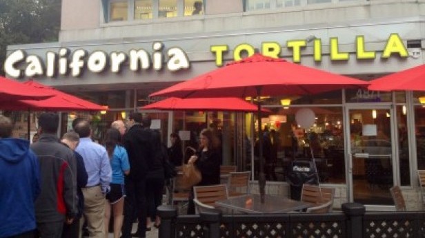 Crowds of people came to snag a free meal at the California Tortilla opening Tuesday. The restaurant moved to a bigger lot at the corner of Norfolk and Cordell Avenues. Photo by Ben Zimmerman.