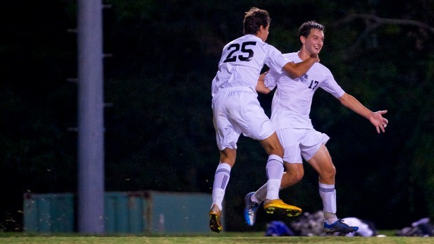 From left to right, forward Kourosh Ashtary-Yazdi and defender Nathan Rackstraw celebrate after Rackstraw scored to seal a 3-0 victory over the Bulldogs. Photo by Billy Bird.