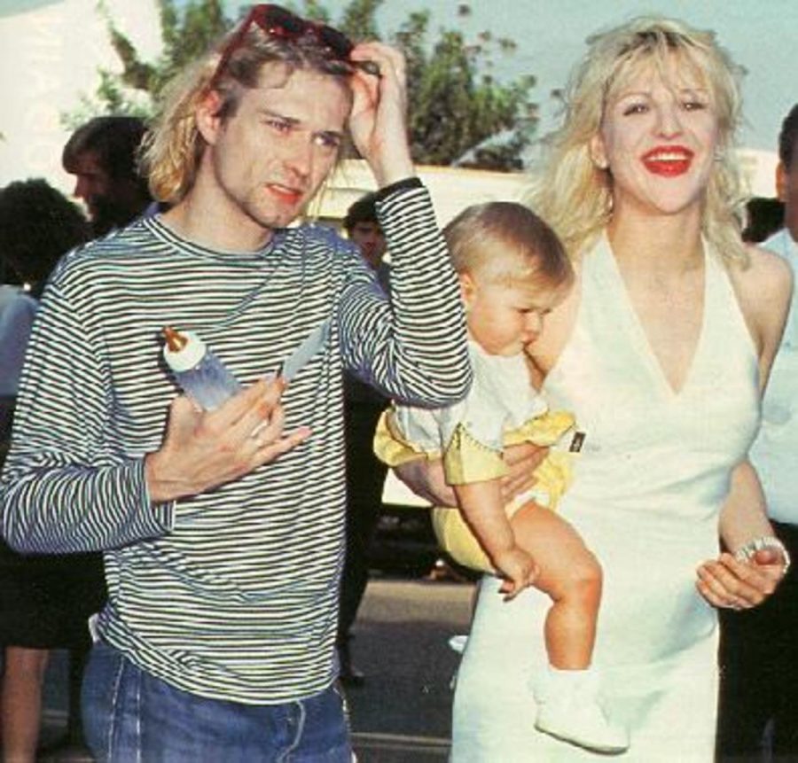 Kurt Cobain and Courtney Love walk with their daughter Francis Bean. The late rock star was recently a potential subject of a musical. Photo courtesy fanpop.com.