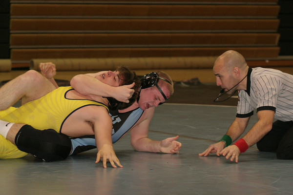 Captain Max Sessions takes down his opponent. Photo by Bonnie Sharbaugh
