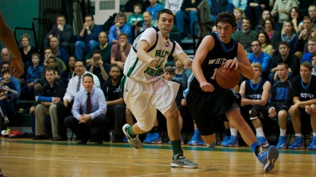 Captain Andrew Castagnetti beats a defender on the dribble as the Vikes defeat the Wildcats 53-47. Photo by Billy Bird.