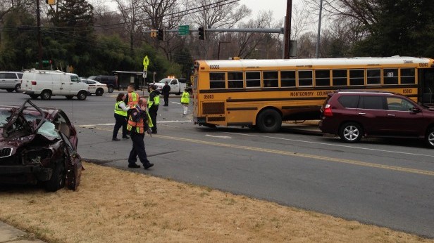 A MCPS schoolbus collided with two cars at the intersection of River Rd. and Whittier Blvd. Photo by Carolyn Freeman.