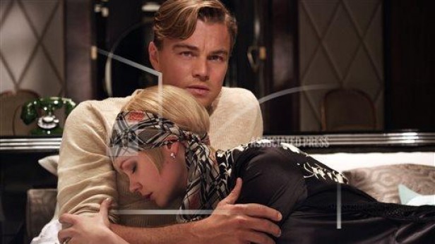 This film publicity image released by Warner Bros. Pictures shows Carey Mulligan as Daisy Buchanan and Leonardo DiCaprio as Jay Gatsby in a scene from The Great Gatsby. (AP Photo/Warner Bros. Pictures)
