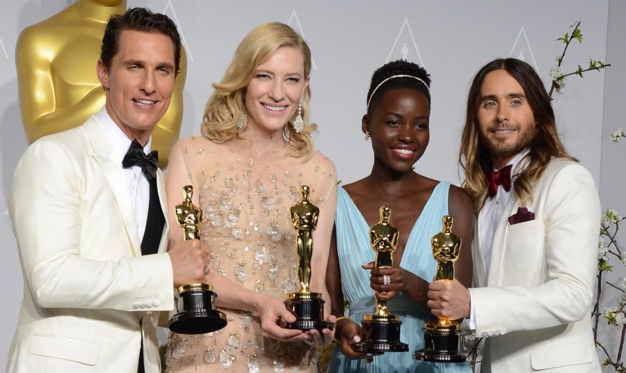 Matthew McConaughey, from left, holds his award for best actor for his role in "Dallas Buyers Club", Cate Blanchett holds her award for best actress in "Blue Jasmine", Lupita Nyongo holds her award for best supporting actress for "12 Years a Slave," and Jared Leto holds his award for best supporting actor in "Dallas Buyers Club" in the press room during the Oscars at the Dolby Theatre on Sunday, March 2, 2014, in Los Angeles.  (Photo by Jordan Strauss/Invision/AP)