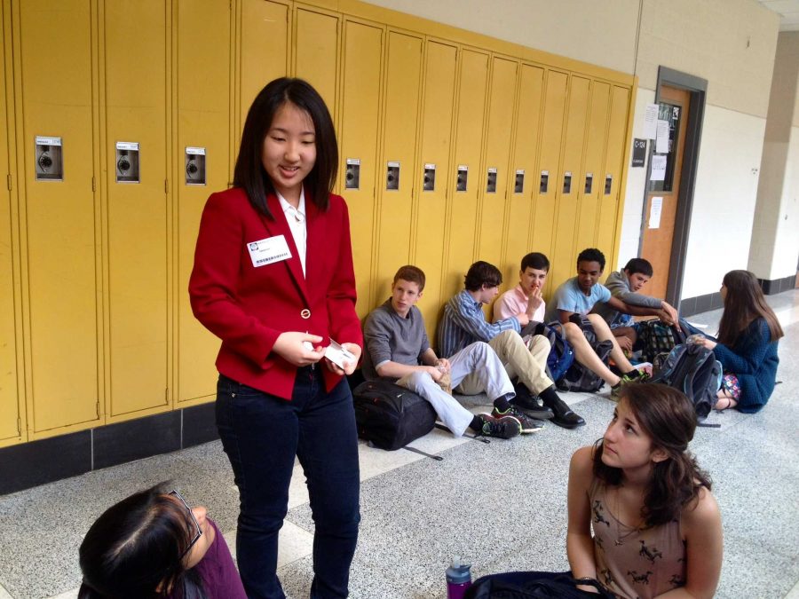 Clarksburg junior Dahlia Huh discusses her campaign strategy for the SMOB election with students.