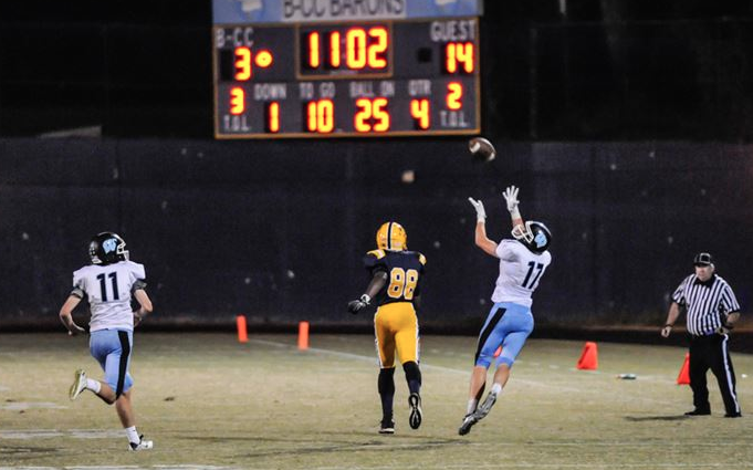 Receiver Nolan Hanessian attempts to make a catch in the fourth quarter against B-CC.  Photo by Chris Hanessian.
