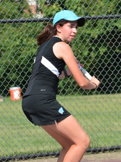Second doubles player Emily Zitner gets ready to return a backhand. Zitner and her partner, Miranda Tompkins, won their match 6-0, 6-0. Photo by Shelley Dane.