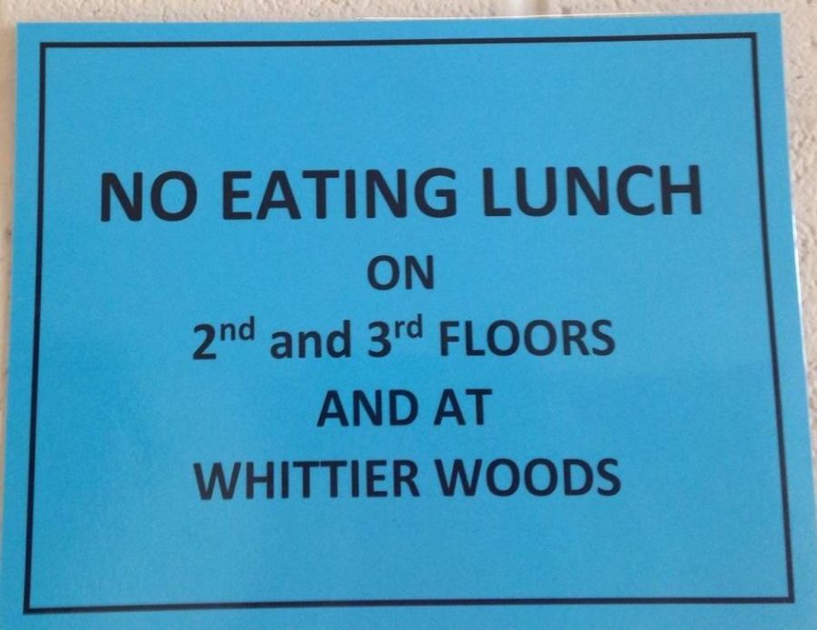 Surely everybody has seen the blue signs plastered all over the school, sheets of paper hung up intermittently every ten feet supposedly telling us to not eat on the second or third hallways during lunch. However, that’s not exactly what they say. Photo by Sebastian van Bastelaer.