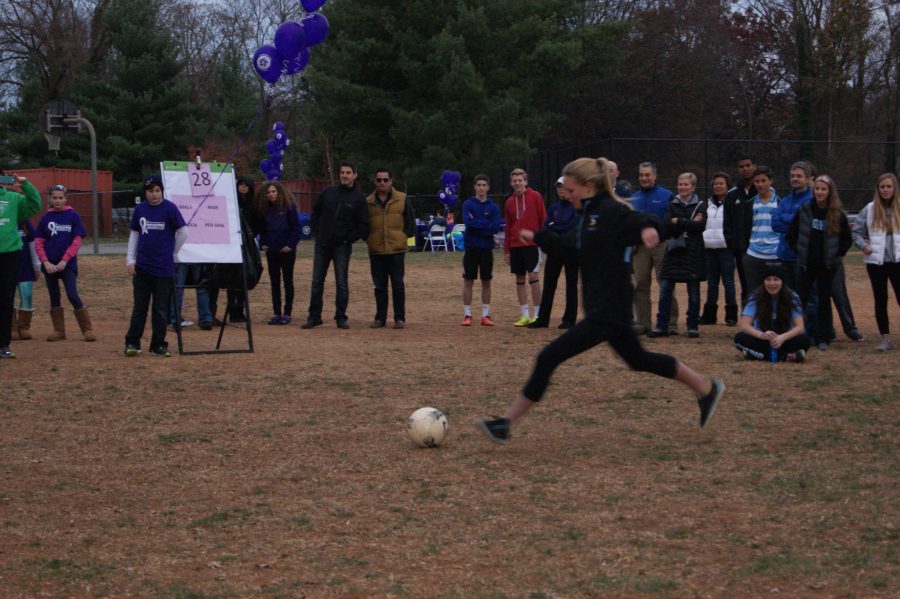 Freshman Lauren Meyer takes a shot in the pancreatic cancer shoot out last Sunday. Photo courtesy Arielle Grill.