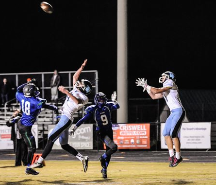 Receiver Nolan Hanessian goes up to snag the Vikings only touchdown of the game. Photo courtesy Chris Hanessian. 
