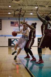 Guard Abby Meyers drives to the basket to score two of her game-high 28 points in Tuesday's 61-51 win over Paint Branch. Photo by Nick Anderson. 