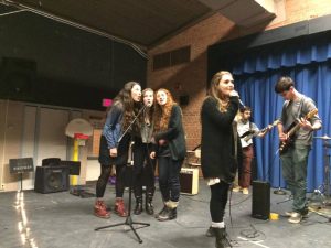 Michelle and the Lovers harmonize during their cover of "Let Me In" by Grouplove. Photo by Nicole Fleck.