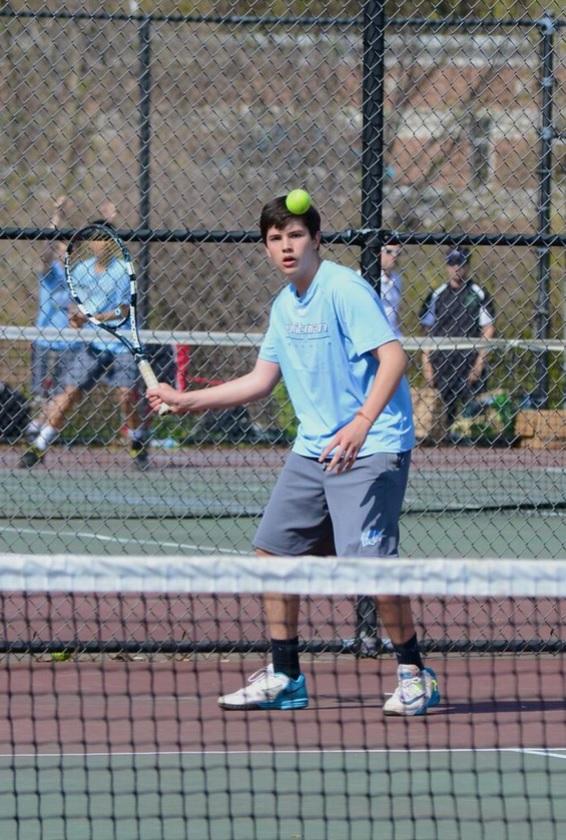 Third doubles player Mauricio Gottret prepares to return a hit with a forehand.  Photo by Michelle Jarcho
