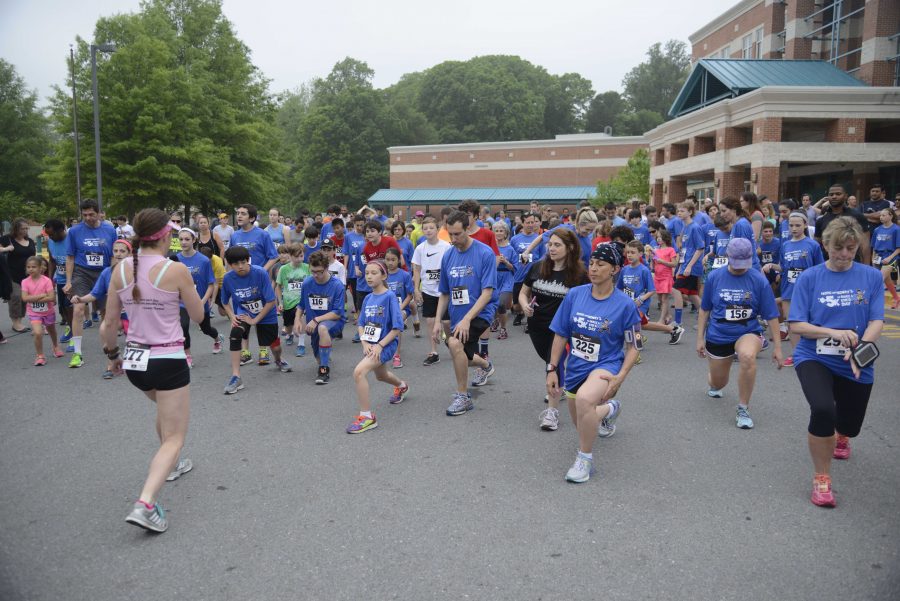 Runners prepare to run in the Hope for Henry 5K last Sunday. Photo by Allen Goldberg. 