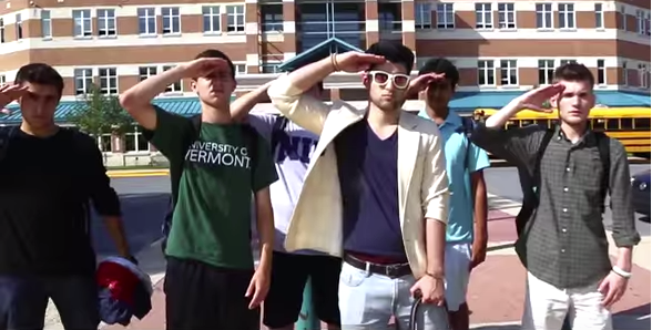 Senior Guilan Massoud, along with several other Whitman students, salute the camera in the Moco Cyper video. Photo courtesy of Andrew and Ramone Messam. 