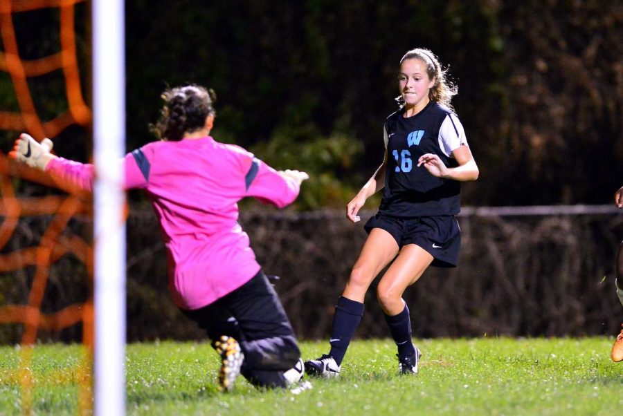 Midfielder Mary Kate Skilling advances on goal moments before scoring. Photo courtesy Adam Prill.