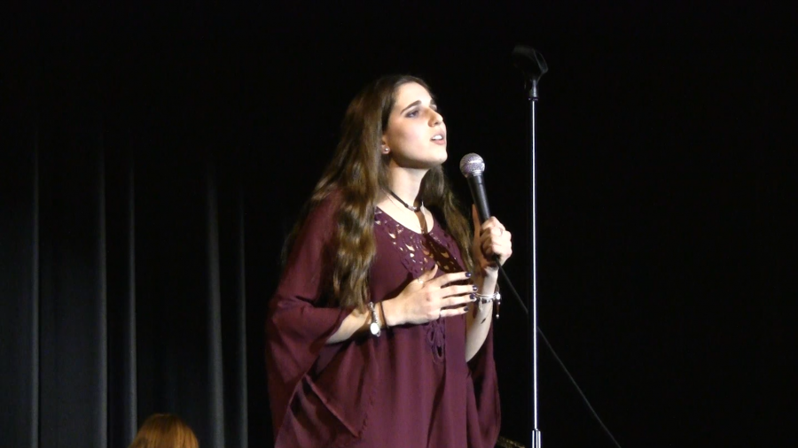 Whitman idol Stefanie Abramowitz performs in the opening song in Whitman idol. Abramowitz won after singing Feeling Good by Nina Simone.
