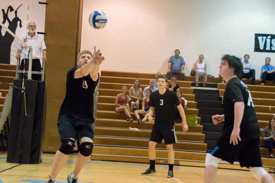 Setter Stefan Greenberg sets up a hit for his teammates in the teams last home game against Damascus. Photo courtesy Sean Lydon.