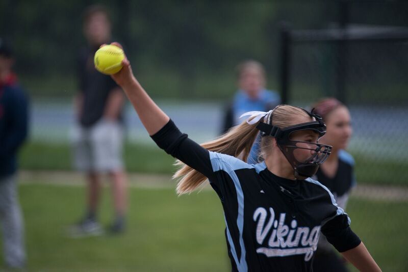 Starting pitcher Riley Kuehn starts her wind-up in the teams loss against NCS. Photo by Jefferson Luo.