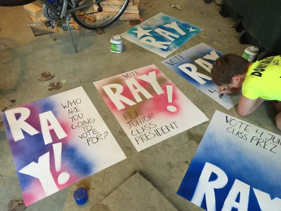 Sophomore Ray Christ works on his campaign posters for class president. Photo by Maria Kozloski.