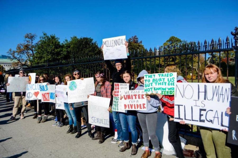 Students held signs outside the White House to show their solidarity with groups they believe President-elect Donald Trump has insulted. Photo courtesy Michael Barsky.