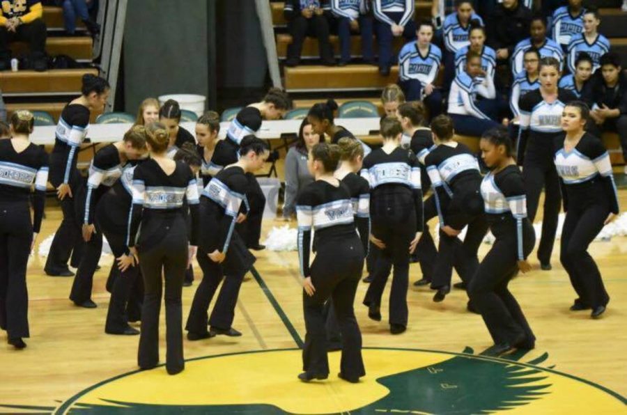 With “Castle” by Halsey blasting through the speakers in the gym at Seneca Valley high school, the poms squad begins their first moves of their routine. Photo courtesy Jeffrey Vogt.