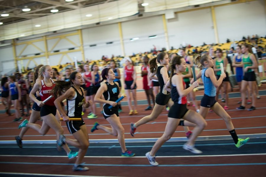 Senior+Lena+Feldman+sprints+in+the+first+leg+of+the+girls+4x800+relay+at+counties.+The+relay+team+will+be+competing+at+states+Feb.+22.+Photo+by+Tomas+Castro.