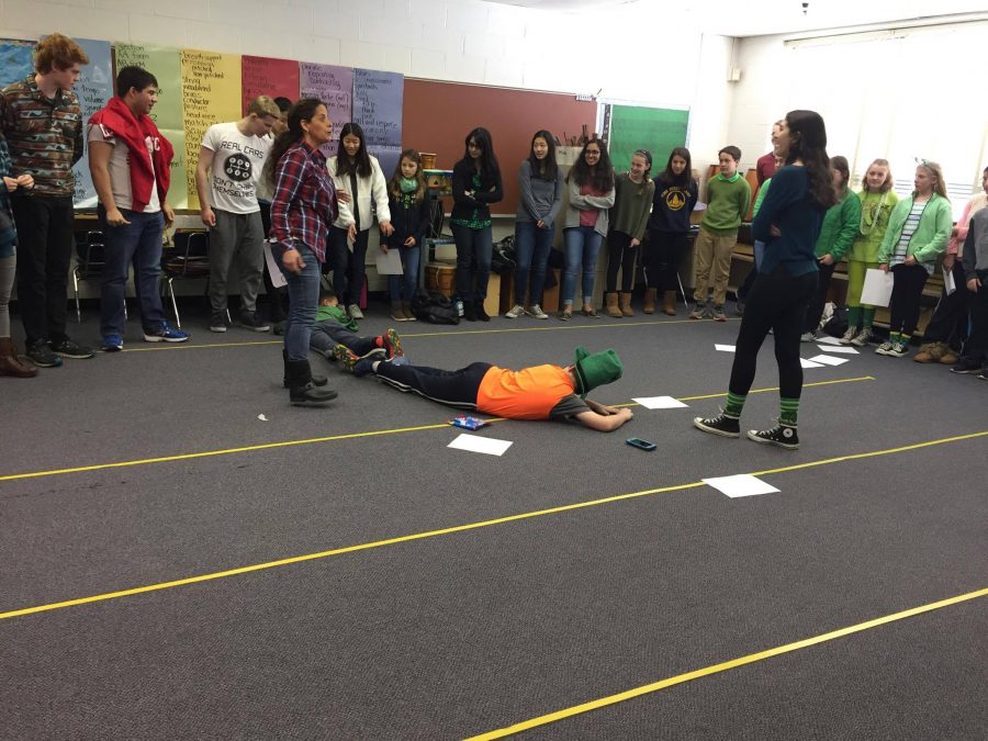 For the diameter activity, 13 students lined up as the diameter of a circle with a circumference of 39 people. Students discovered that the diameter went around the circle approximately three times, which is close to pi. Photo by Pearl Sun.