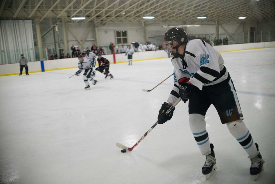 Forward Neil Abromowitz carries the puck in the teams 7-1 win over Quince Orchard.