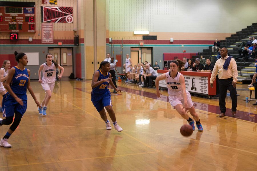 Guard Abby Meyers drives to the basket in the teams dominant 69-46 win over Gaithersburg. The Vikes outscored opponents in wins by a combined 662 points this year. Photo by Tomas Castro.