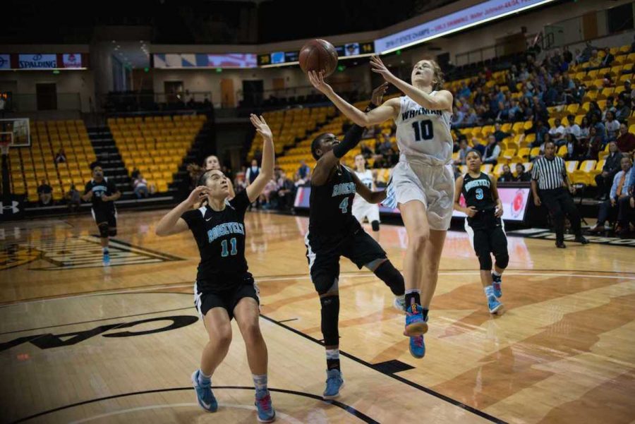 Guard Abby Meyers takes a layup in the state semi-final. Meyers had 21 points in the victory.