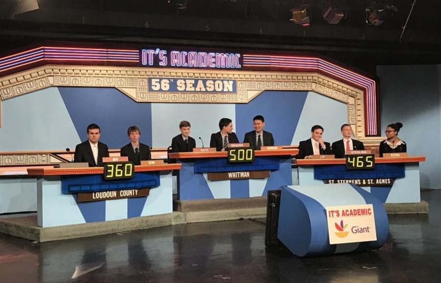 Whitmans Quiz Bowl Team, pictured in the center, made a dramatic comeback in the closing minutes to secure a place in the semifinal round. Photo by Julie Rosenstein. 