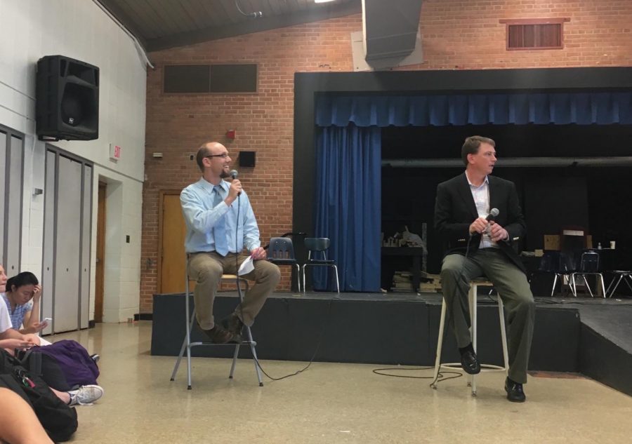 AP Government teacher Colin OBrien (left) and same-sex marriage lawyer Douglas Hallward-Driemeier (right) address students in the auditorium. Hallward-Driemeier told students about his experiences appearing before the Supreme Court 16 times. Photo by Eva Liles. 