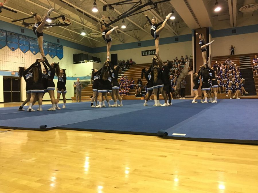 Whitman Cheer competes in their annual invitational. Although the team didnt place, they came up against tough competition. 
Photo by Jessie Solomon