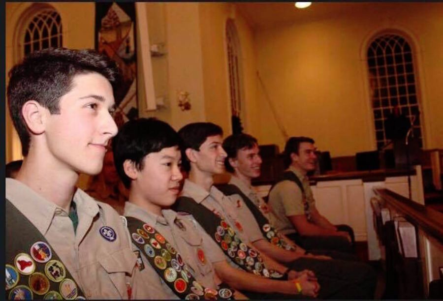 Reed Fedowitz (17) and other Boy Scouts sit in a meeting. Many students, more male and female, disagree with the new rule allowing girls to become Eagle Scouts. Photo courtesy Michael Schecter.