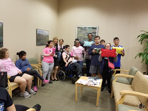 Students in two special education programs deliver their pillows to cancer patients at Suburban Hospital. The project is part of the programs’ community service. Photo courtesy Veronica Garner.
