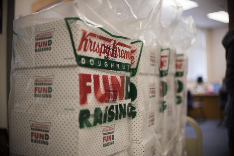 Doughnuts sit in the main office before distribution. Administrators distributed Krispy Kreme doughnuts to students Dec. 22. Photo by Annabelle Gordon. 
