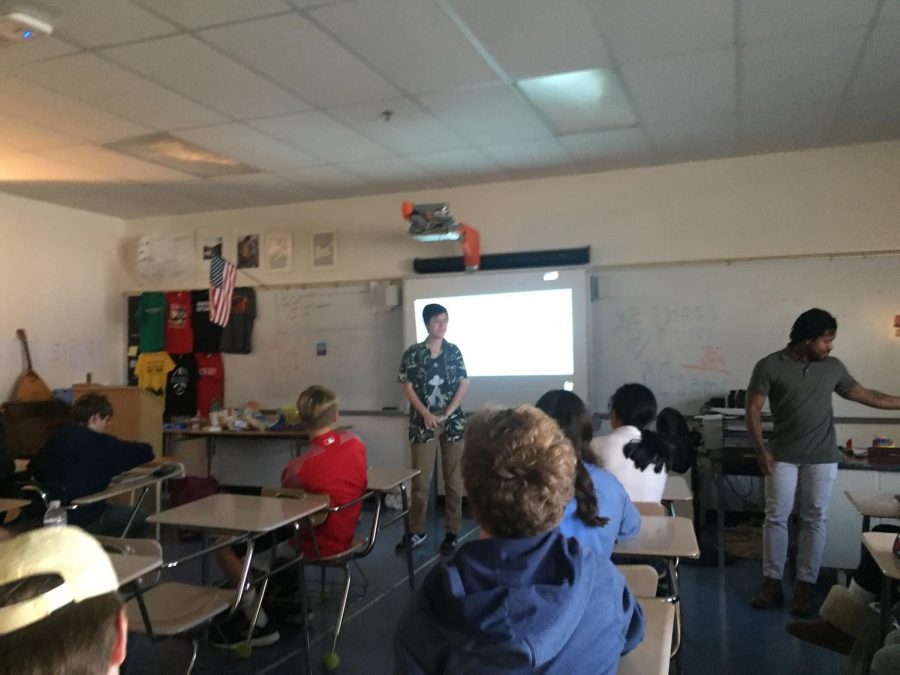 Junior Lukas Gates teaches a freshman English class on transgender issues. Gates ran the presentations as part of English teacher Omari James Taste of the World At Large lessons. Photo by Zoe Kaufmann. 